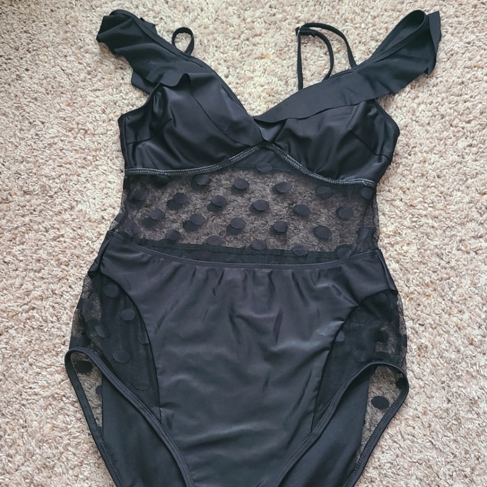 One piece swimming suit with sheer Polkadot middle & thighs